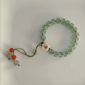 Green Jadeite and Carnelian Beaded String Pull Bracelet with Flower Charm